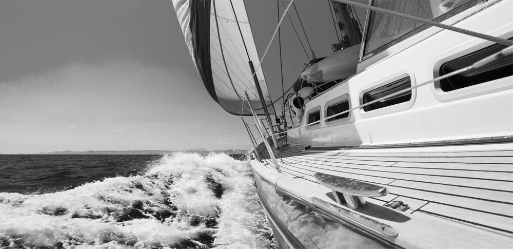 Side shot in black and white of yacht