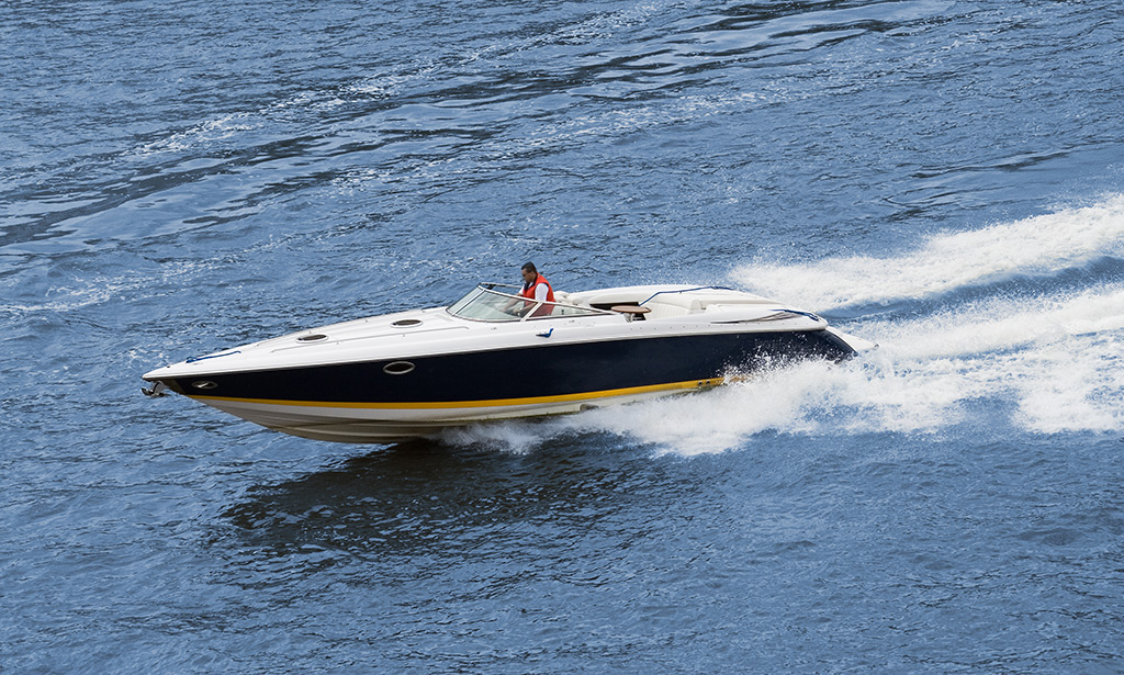 Speed Boat racing across the ocean